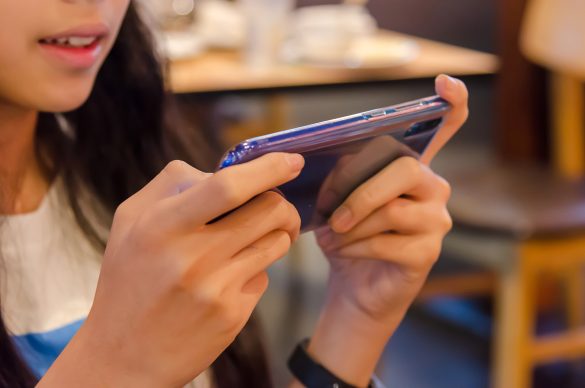 Child playing game on phone
